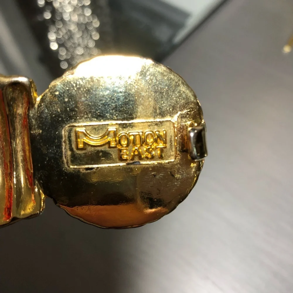 Vintage Clip Belt, by Motion East.
